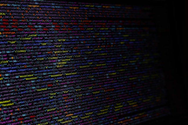 Computer screen filled with jumbled nonsensical code symbolizing data overload before AI analysis.